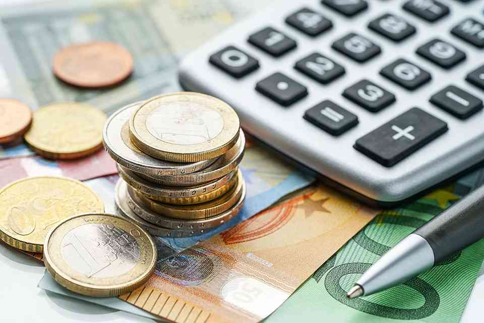 Münzen und Taschenrechner